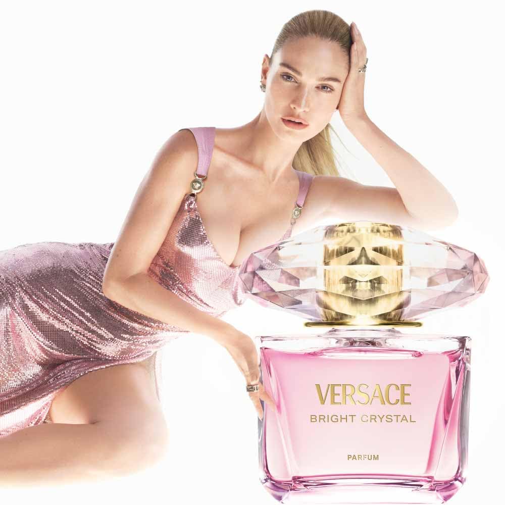 Versace Bright Crystal being sprayed on wrist demonstrating easy application and immediate scent benefit