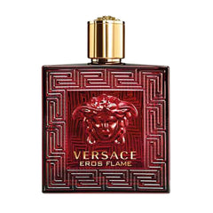 Versace Eros Flame on a nightstand in evening setting, evokes confident wear