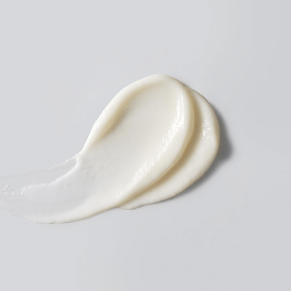 Versed Good Defense texture closeup demonstrating sheer, non-greasy feel