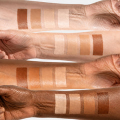 Vibriance stick held in hand showing portable size and quick touch-up benefit