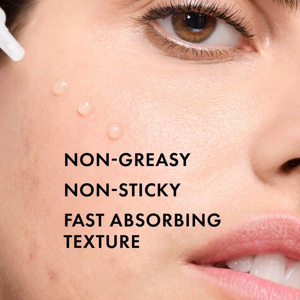 Vichy Normaderm serum on hand demonstrating easy spreadability and quick absorption benefit