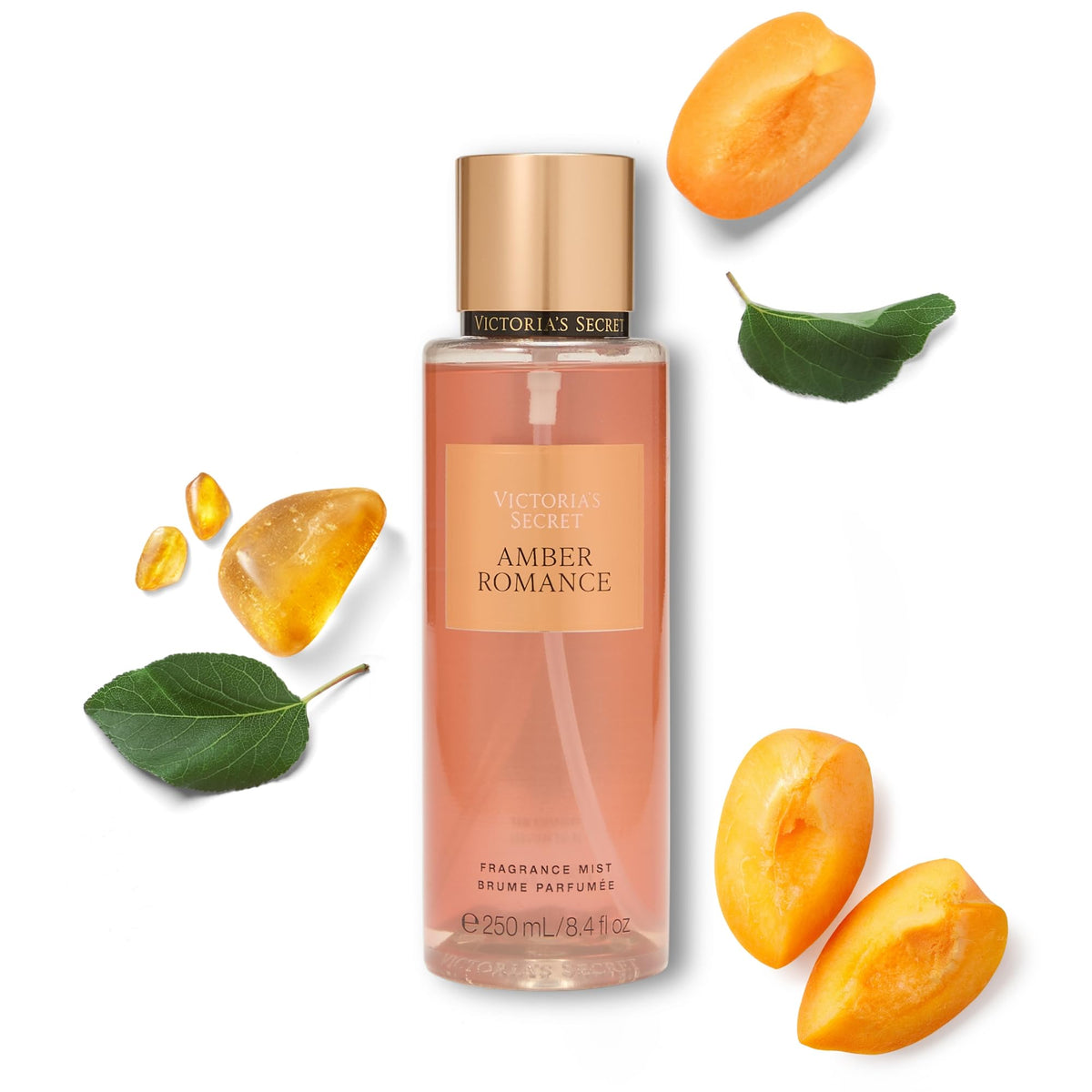 Victoria's Secret front bottle view showing amber-scented mist and elegant packaging benefit: easy identification