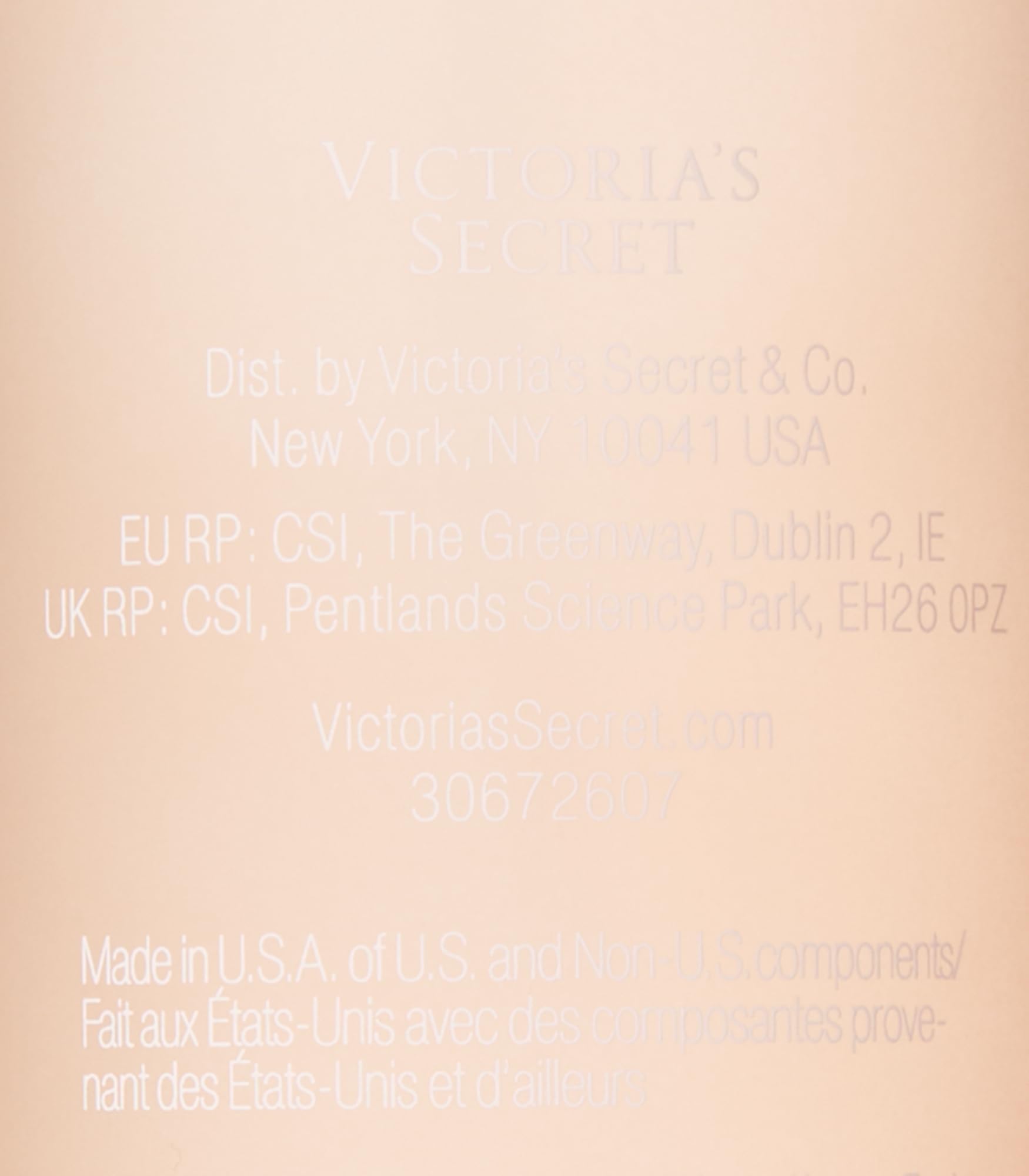 Lifestyle scene on bathroom shelf with Victoria's Secret mist suggesting warm, comforting vanilla-woody ambiance
