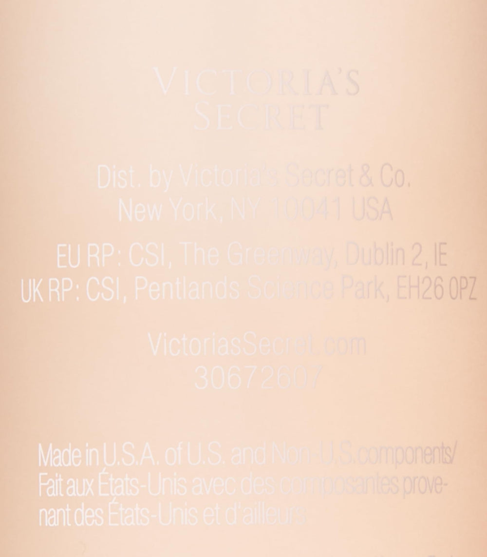Lifestyle scene on bathroom shelf with Victoria's Secret mist suggesting warm, comforting vanilla-woody ambiance