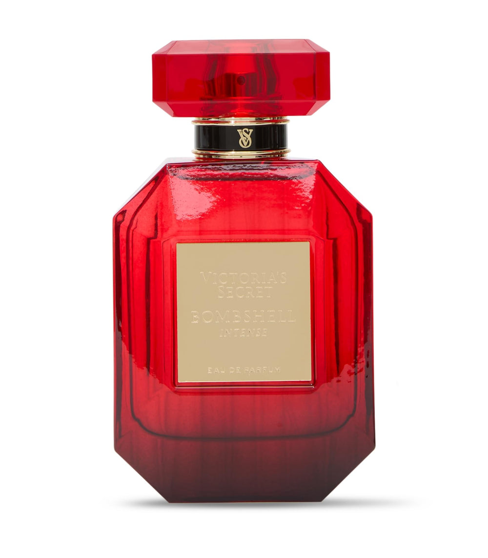 Victoria's Secret angled bottle reflecting light to emphasize premium glass and depth