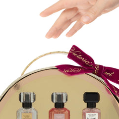 Victoria's Secret mini bottle inside travel pouch showing size next to passport benefit: convenient for travel
