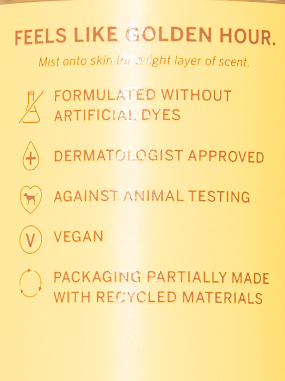 Victoria's Secret close-up label showing scent notes and ingredient clarity benefit