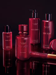 Victoria's Secret label close-up with orchid motif showing fragrance notes and luxury feeling