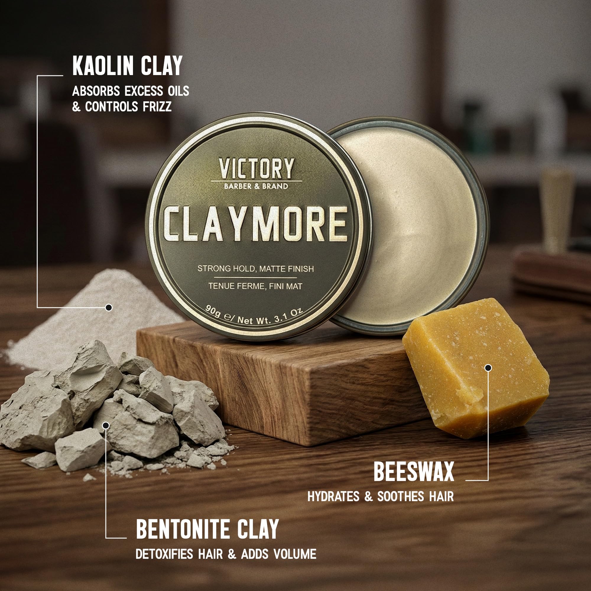 Victory Barber & Brand clay on fingers demonstrating easy warming and spreadability