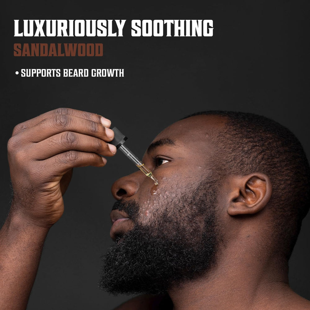 Viking Revolution man applying oil to beard for softer, frizz-free facial hair