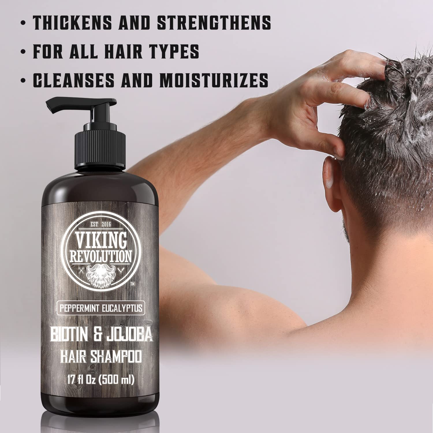 Viking Revolution bottle beside a hand to show 17 oz size and lasting value
