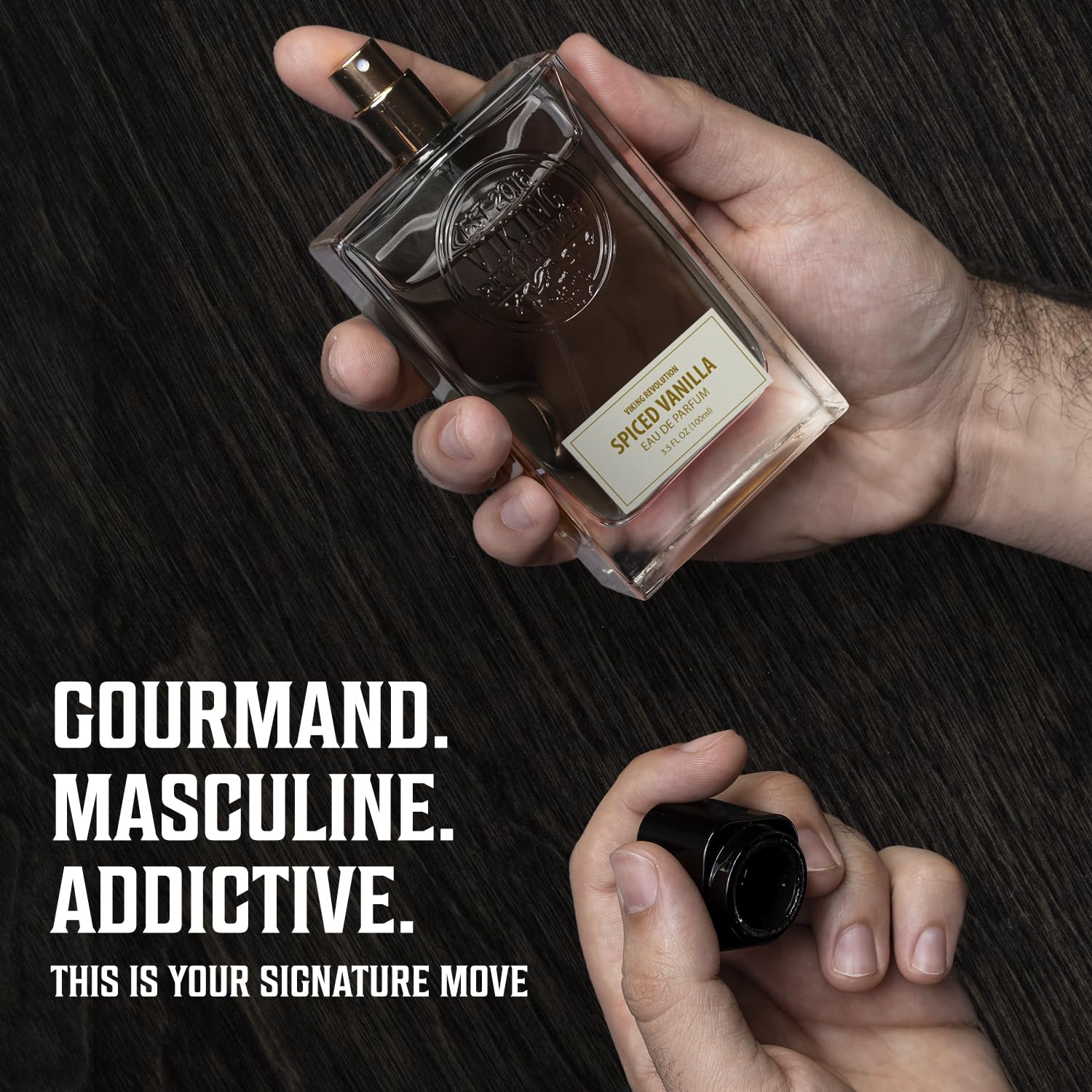 Viking Revolution cologne spray in use demonstrating confident application