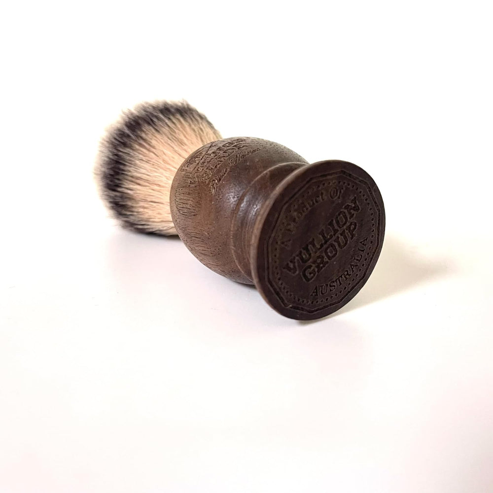 VIKINGS BLADE brush applying lather on face for smooth shave