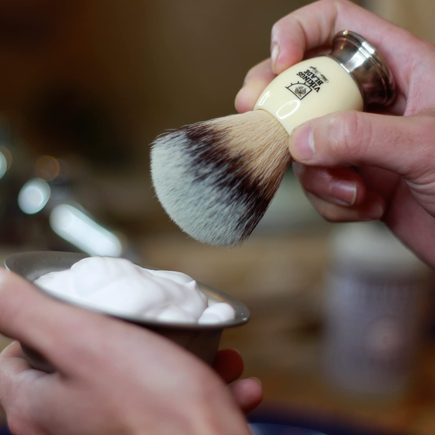 VIKINGS BLADE brush in use creating thick foam for a smooth shave benefit