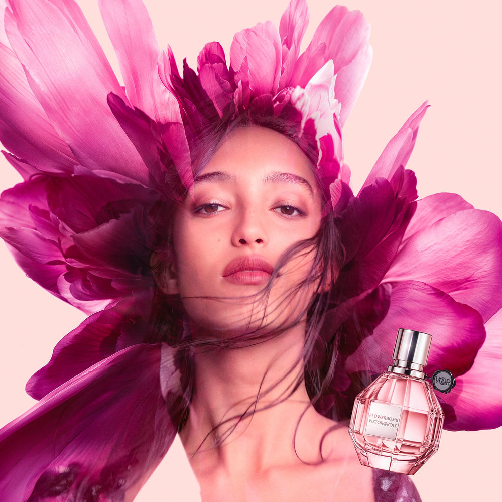 Viktor&Rolf spray action in use, conveys easy application and scent release