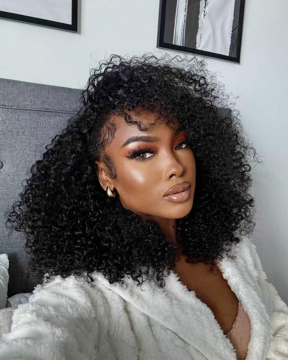 virginess front view of 16 inch kinky curly half wig showing natural hairline and volume