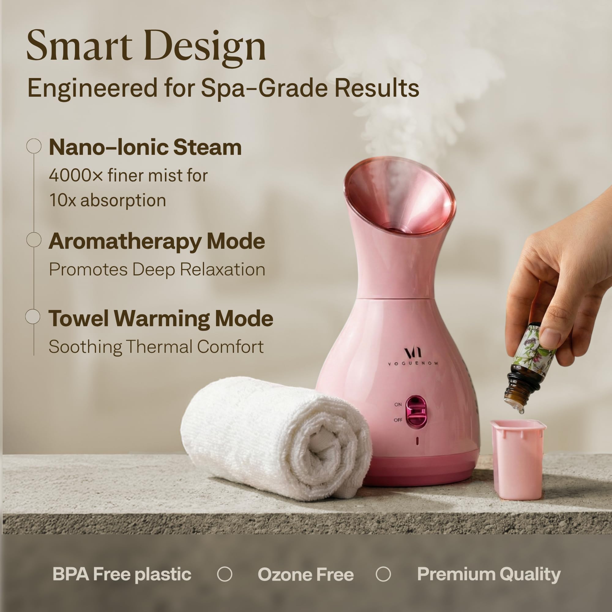 VogueNow steamer next to hand to show compact size and portability