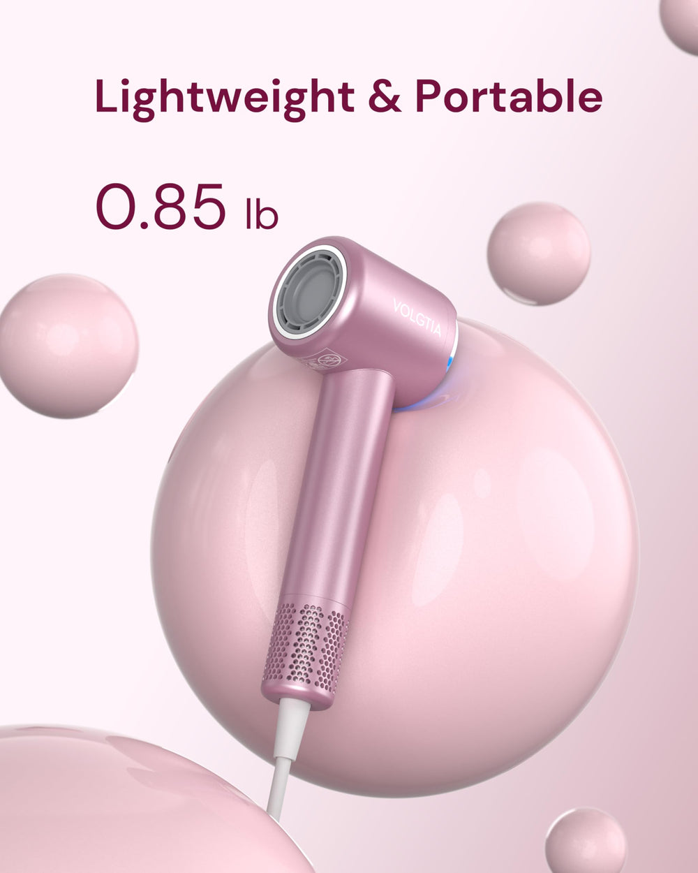 Volgtia dryer in use on model showing efficient styling and enhanced shine