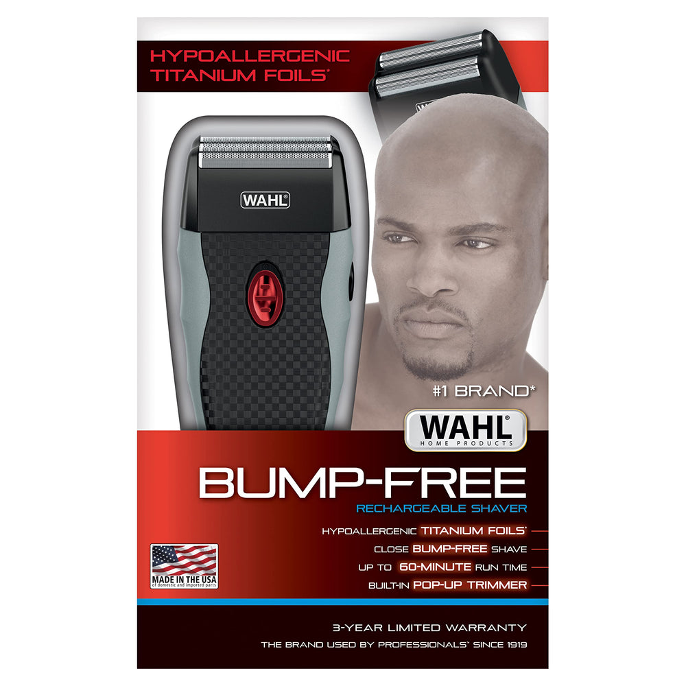 Wahl cleaning brush removing hairs from foils to maintain optimal performance