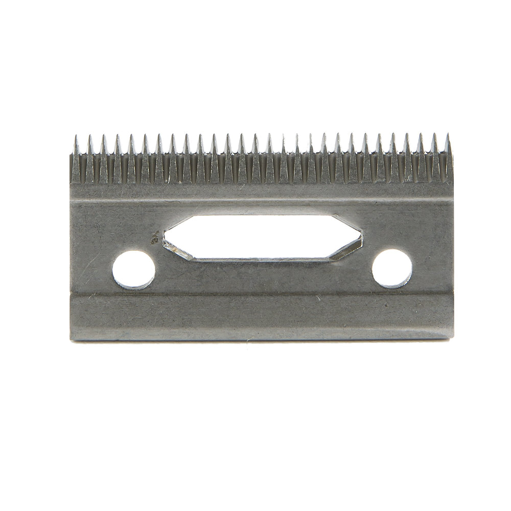 Wahl professional blade next to hand and ruler showing compact size and easy handling