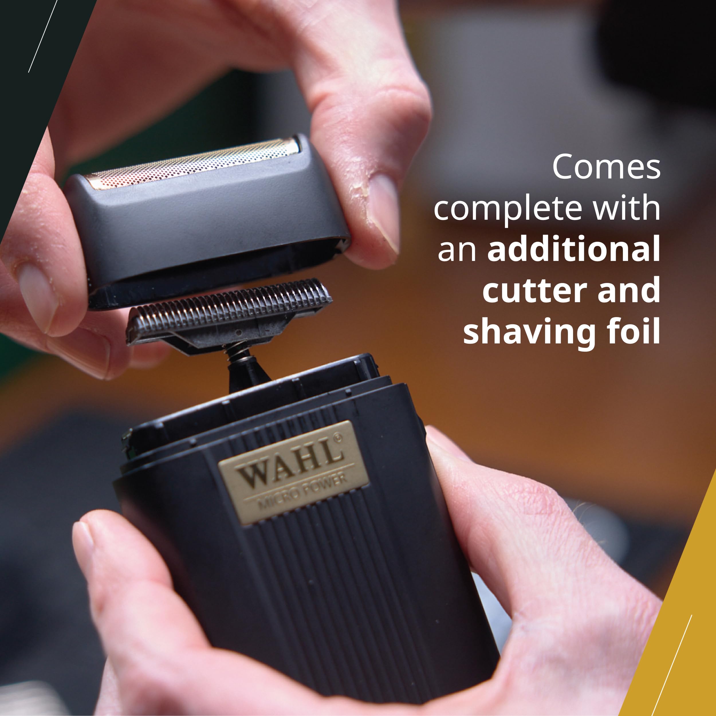 Wahl Professional shown next to a hand to show scale and portable convenience