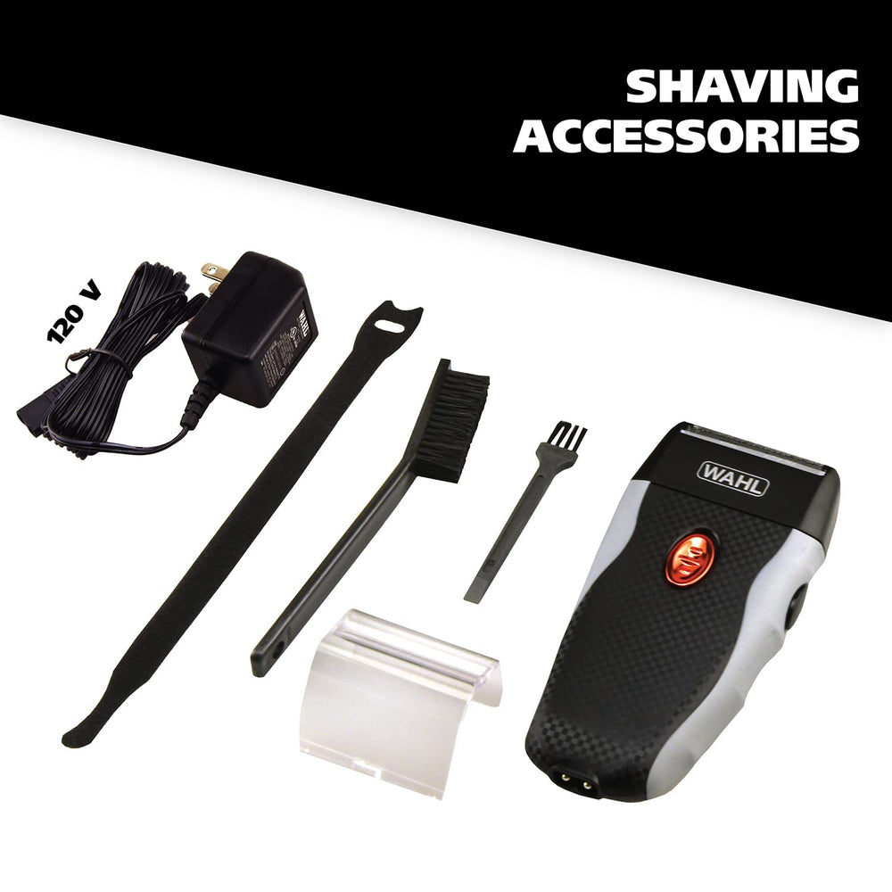 Wahl shaver in hand illustrating compact size and travel-friendly scale
