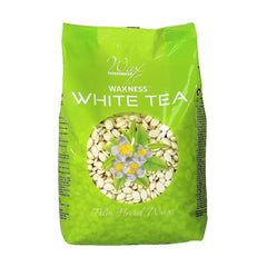 Waxness front packaging showing white tea cream beads and benefits