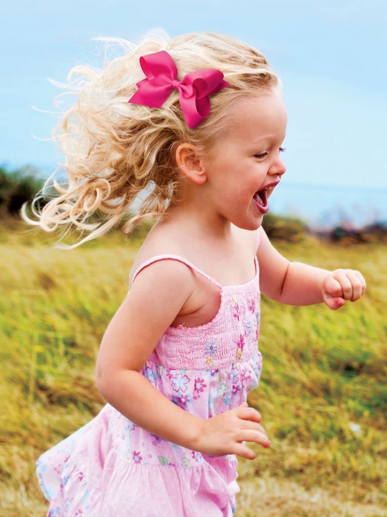 Wee Ones bow worn by child demonstrating comfortable, all-day hold
