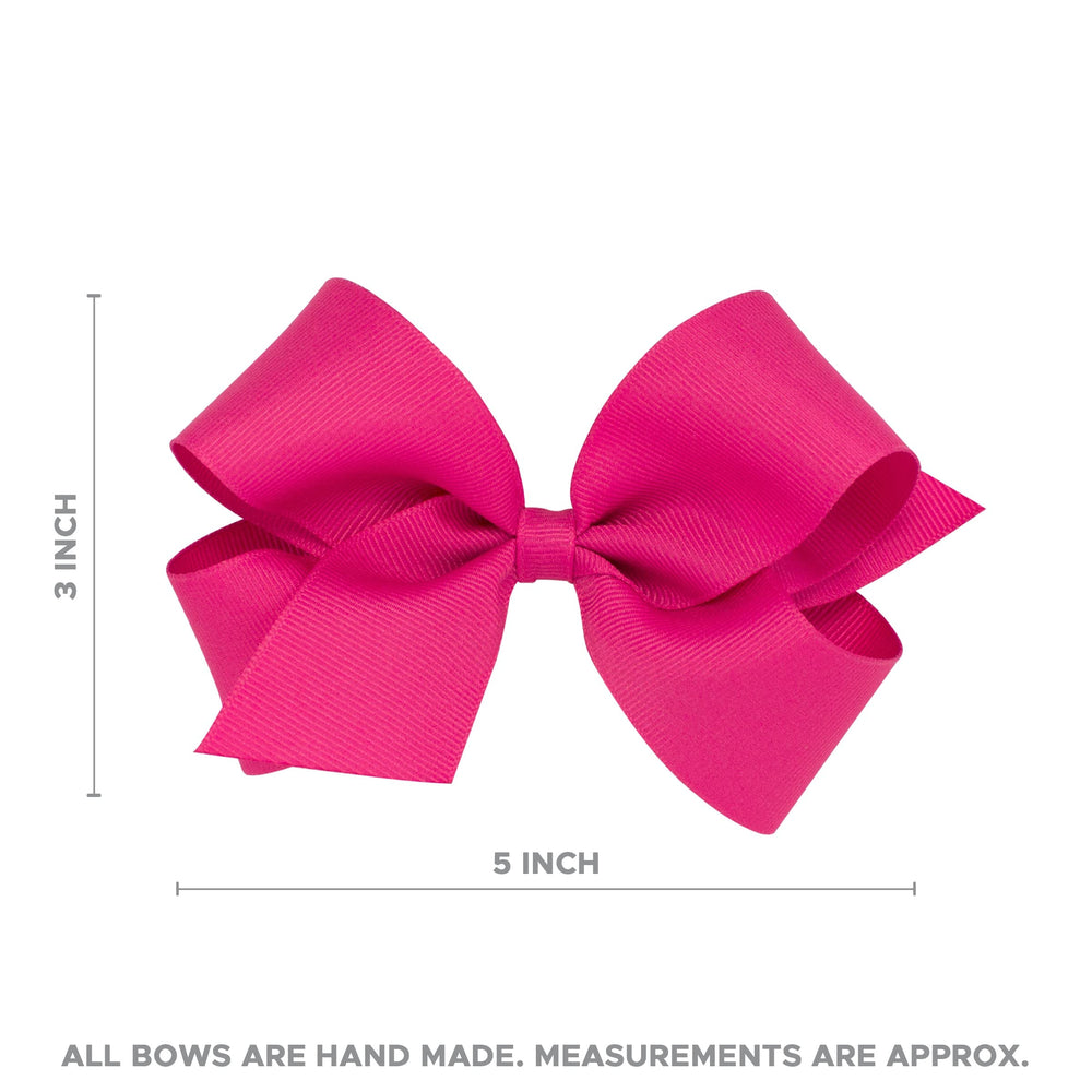 Wee Ones bow in packaging in lifestyle scene ideal for gifting