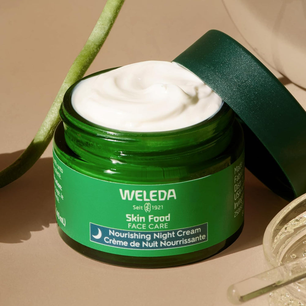 Weleda Skin Food open lid with cream visible conveying easy scoop and nourishment