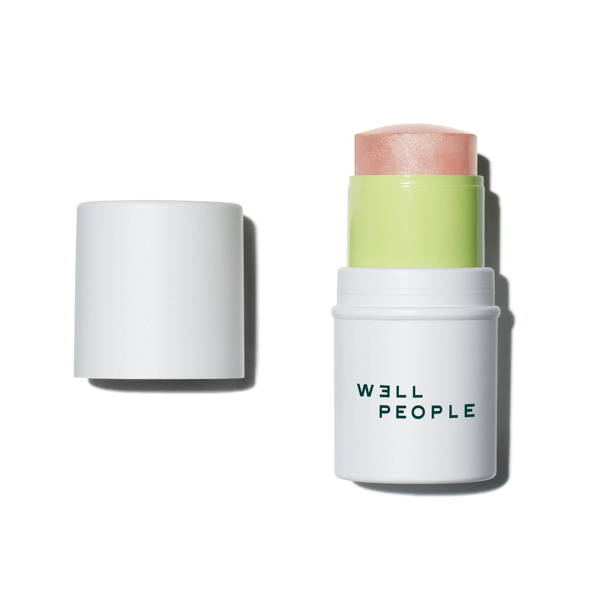 Well People stick front view showing rose glow shade and portable applicator