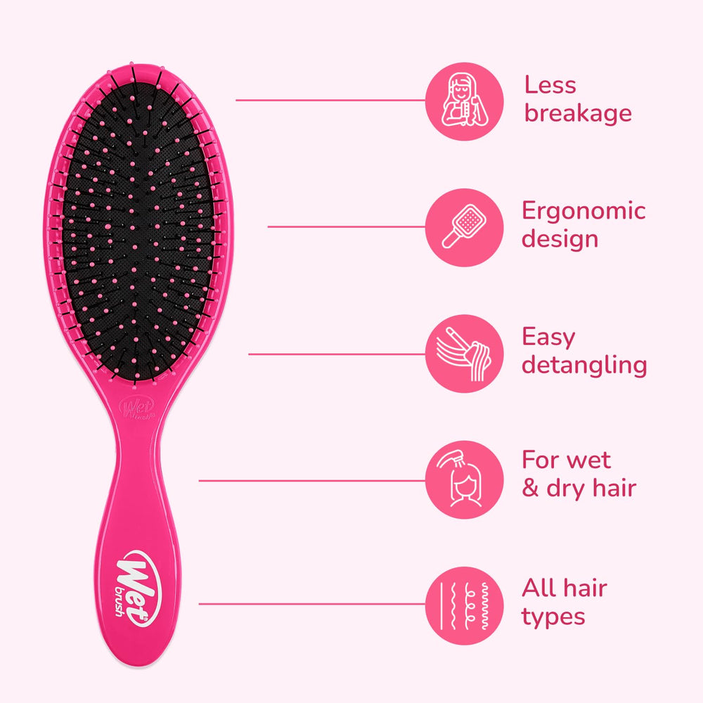 Wet Brush pictured in hand to show grip and lightweight handling advantage