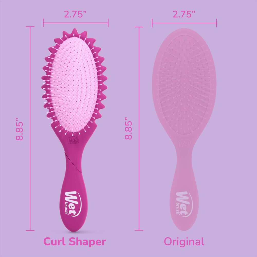 Wet Brush Curl Shaper in hand to show size and easy handling while styling