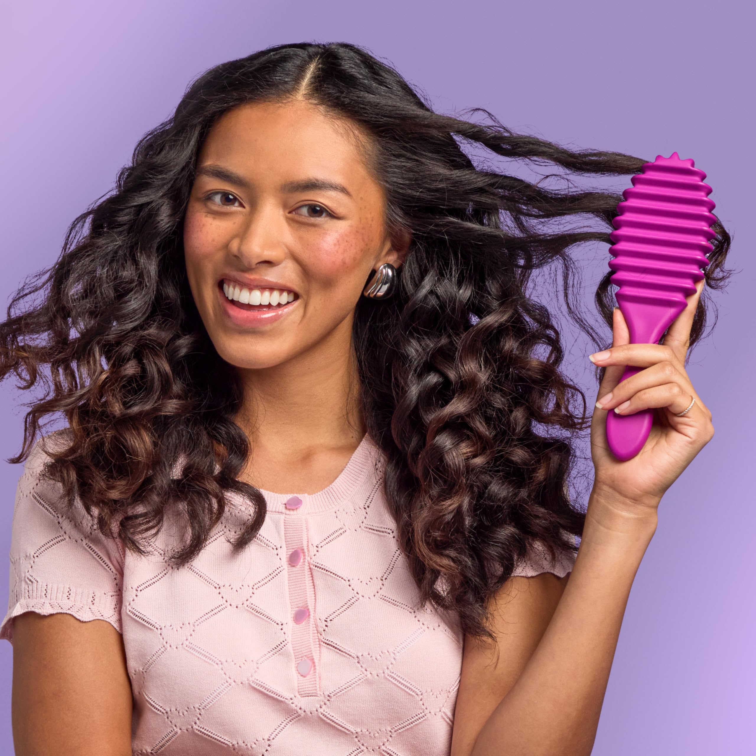 Wet Brush Curl Shaper beside conditioner bottle indicating improved slip during detangling