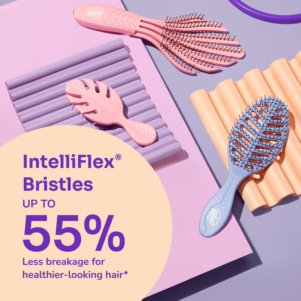 Wet Brush used on curly hair to smooth frizz and define curls
