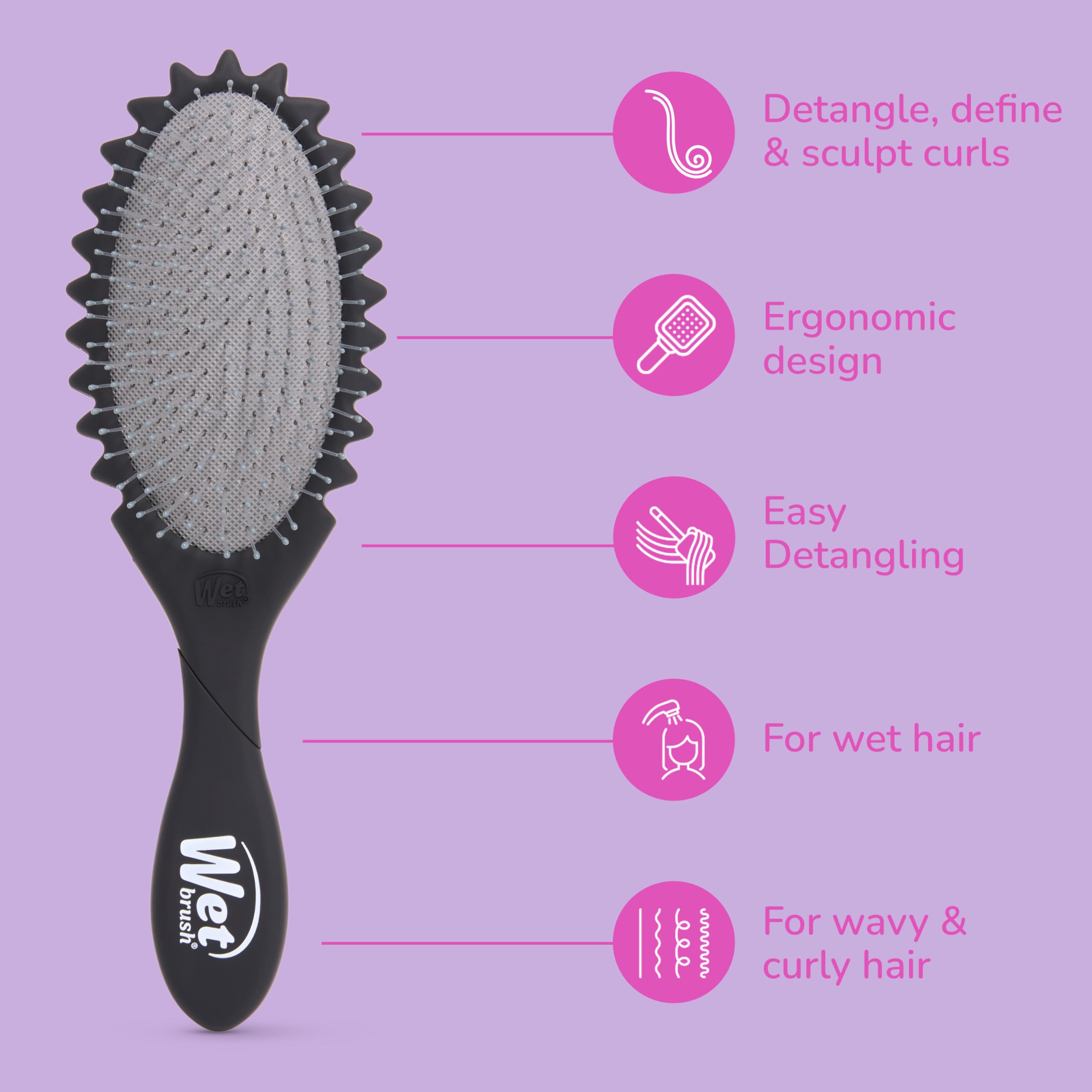 Wet Brush held in hand demonstrating compact travel-friendly size
