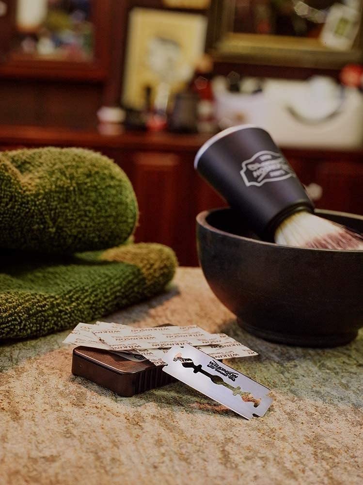 Wilkinson Sword blades on bathroom counter with shaving gear showing daily routine benefit