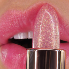 WINKY LUX product on lips close-up showing personalized pink tint and subtle shine benefit