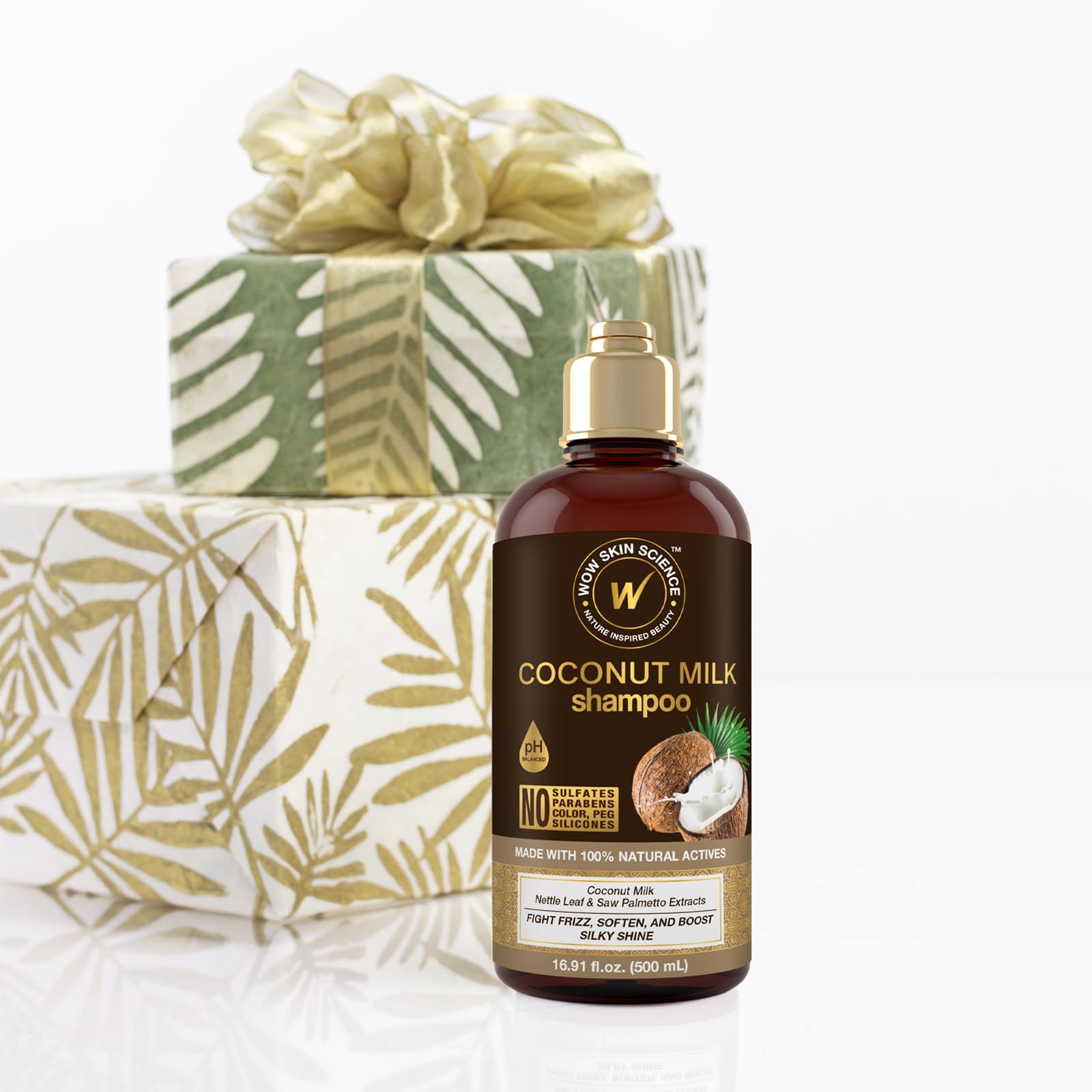 WOW Skin Science shampoo on wavy hair in use delivering curl definition