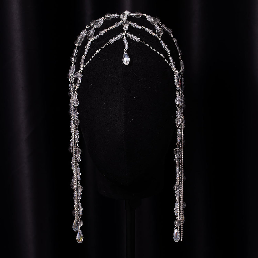 Xerling side profile worn in hair showing fit and graceful chain fall