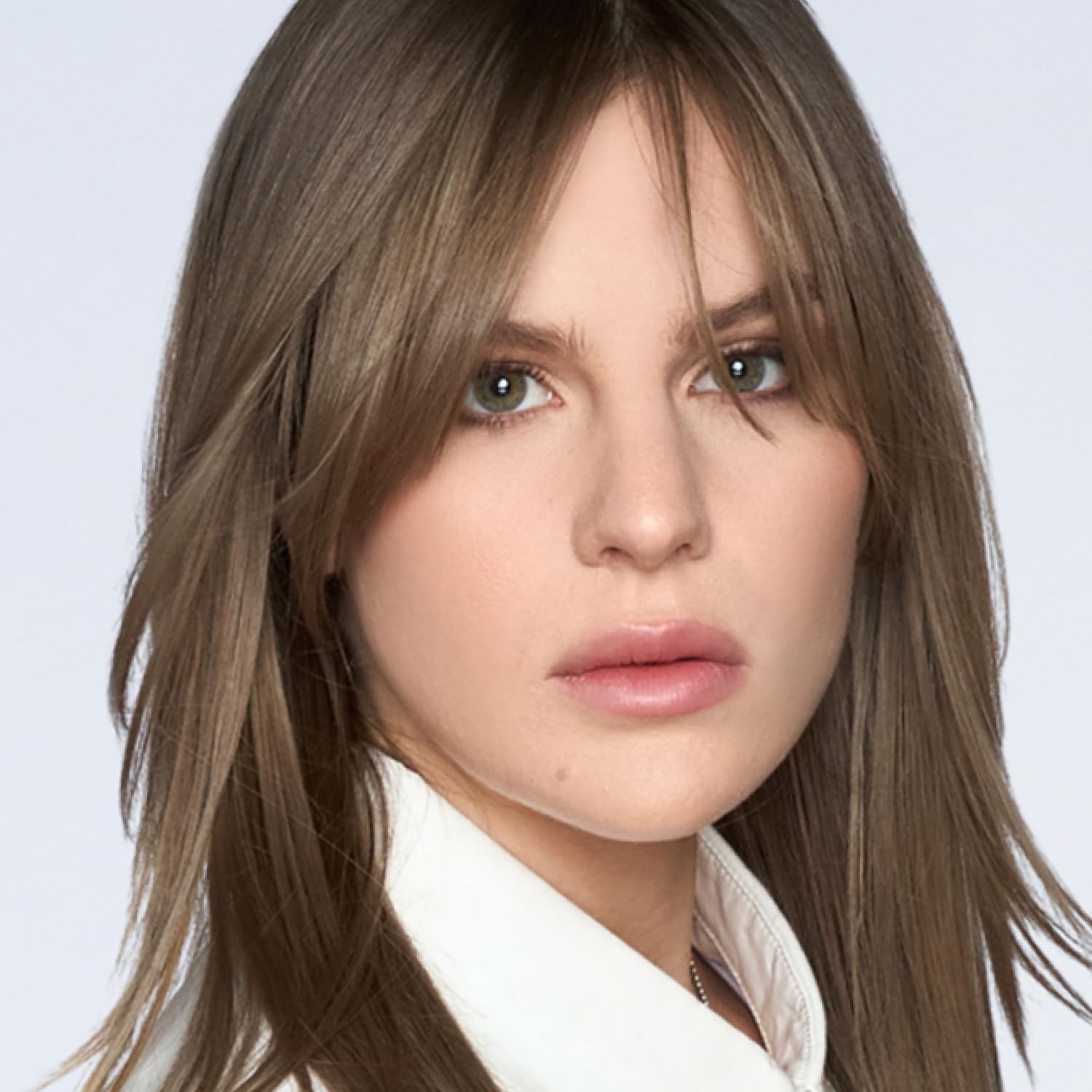 XMONDO close-up of creamy mask texture highlighting rich pigment and smooth conditioning feel