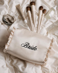 xo, Fetti close-up of black "bride" embroidery, clear celebratory branding for weddings