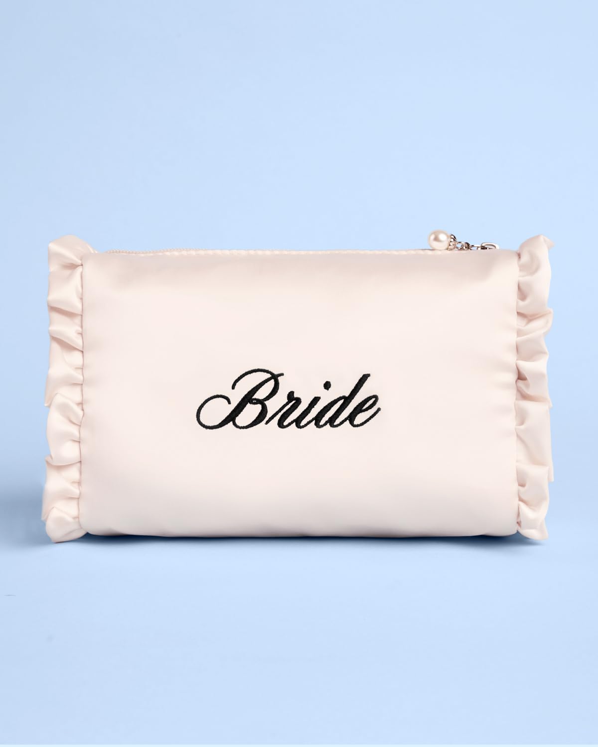 xo, Fetti cosmetic bag on vanity during bridal prep, stylish addition to getting-ready routine