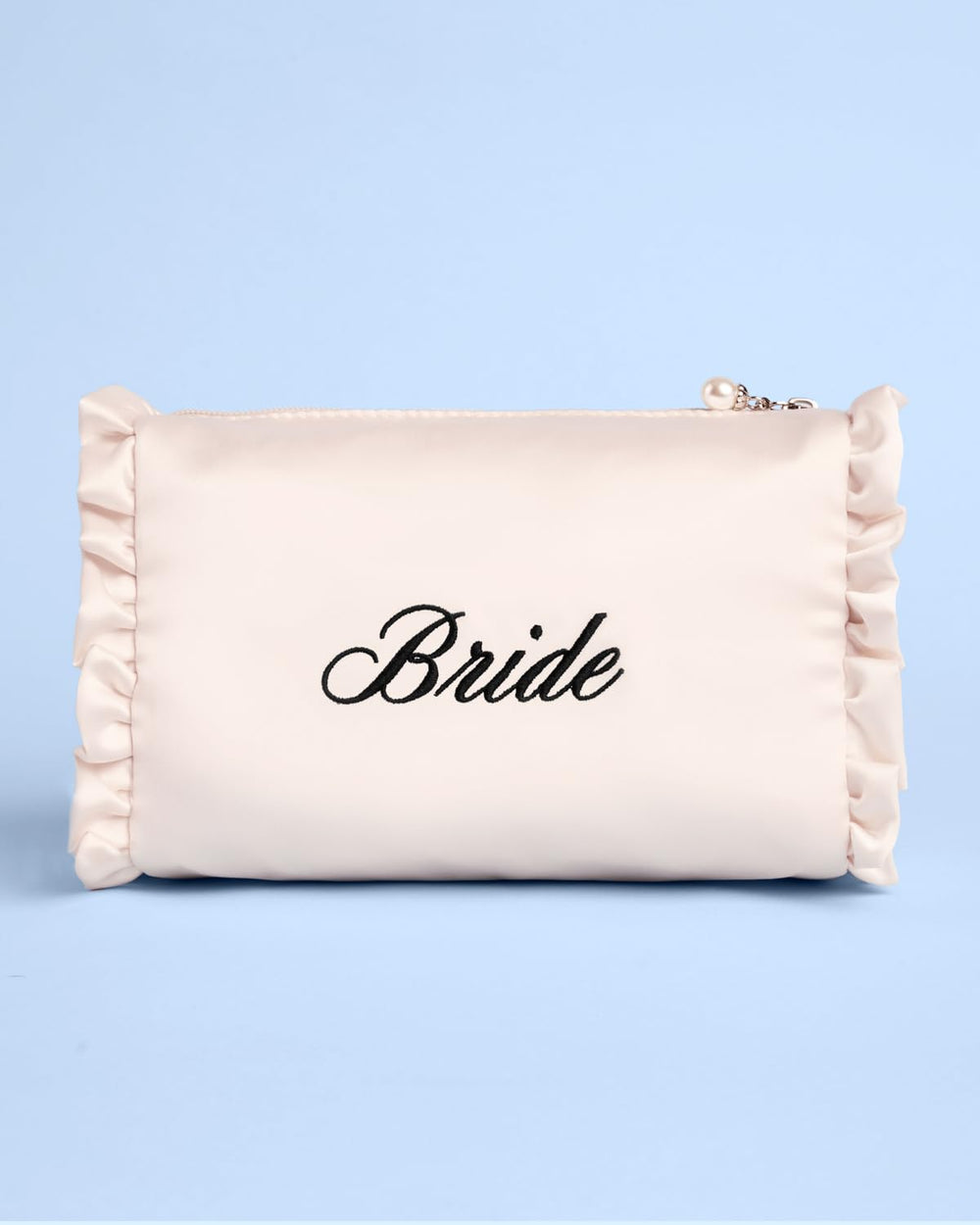 xo, Fetti cosmetic bag on vanity during bridal prep, stylish addition to getting-ready routine