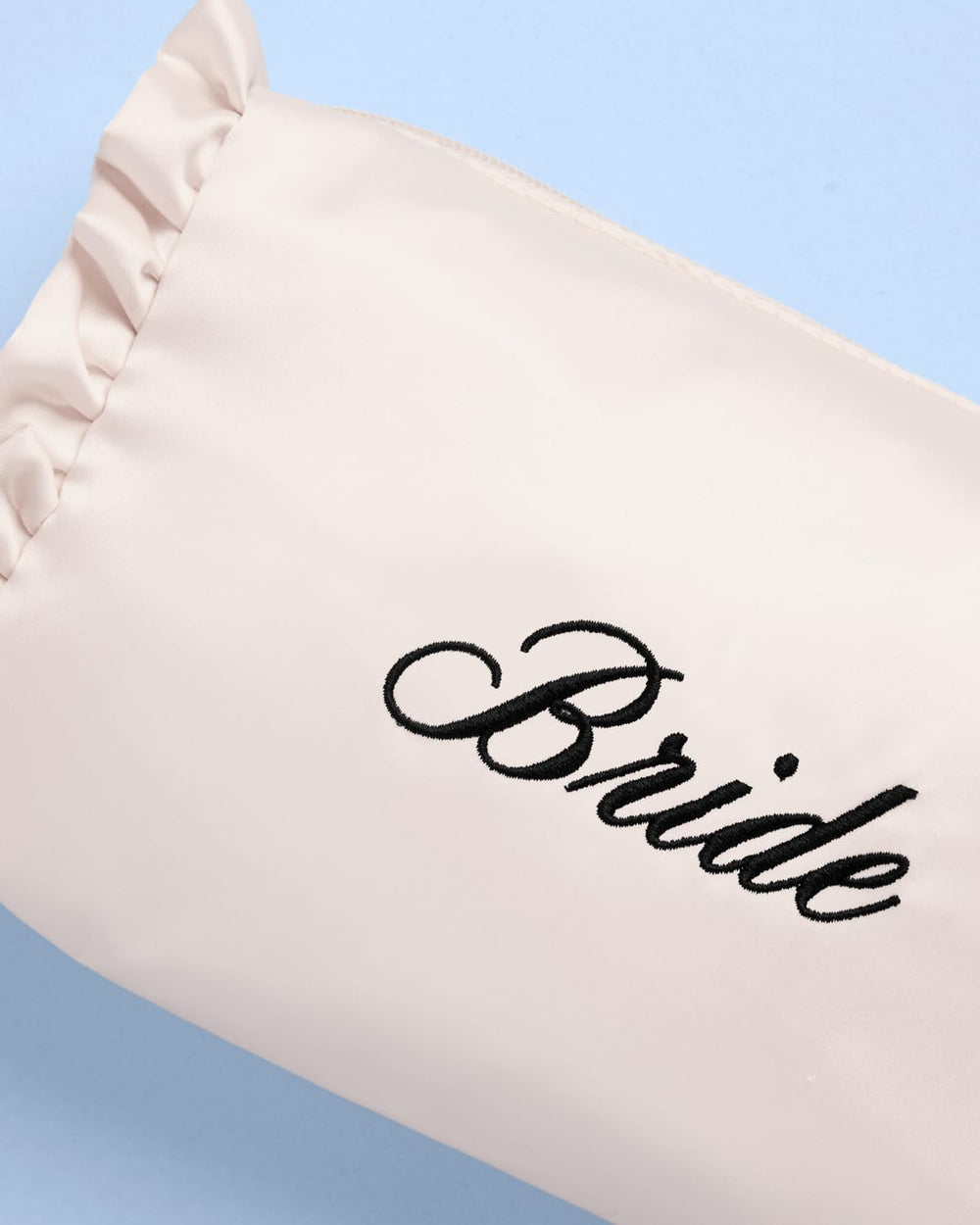 xo, Fetti pearl zipper detail closeup, polished closure adds decorative charm