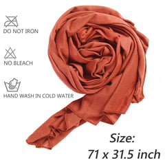 XTREND woman tying head wrap demonstrating easy knotting and secure fit benefit