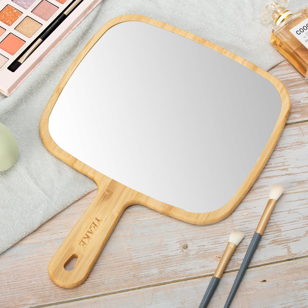 YEAKE mirror on a vanity styled scene adding natural warmth