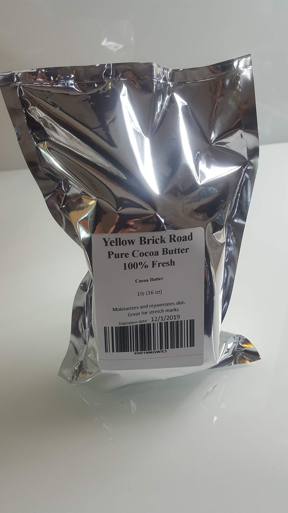 Yellow Brick Rd raw cocoa butter texture close-up showing creamy consistency and natural aroma