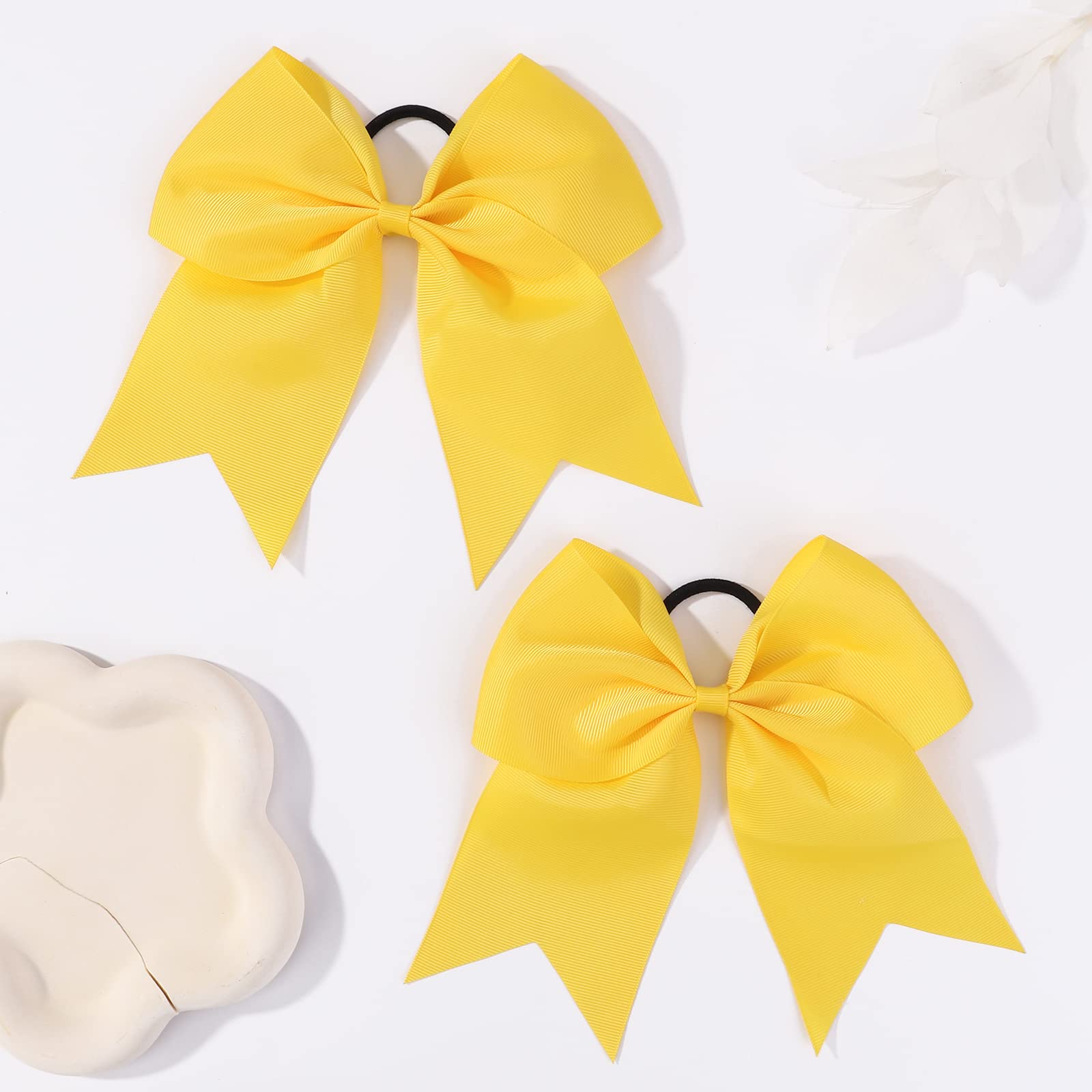 YHXX YLEN cheerleaders wearing bows demonstrating visibility and uniformity