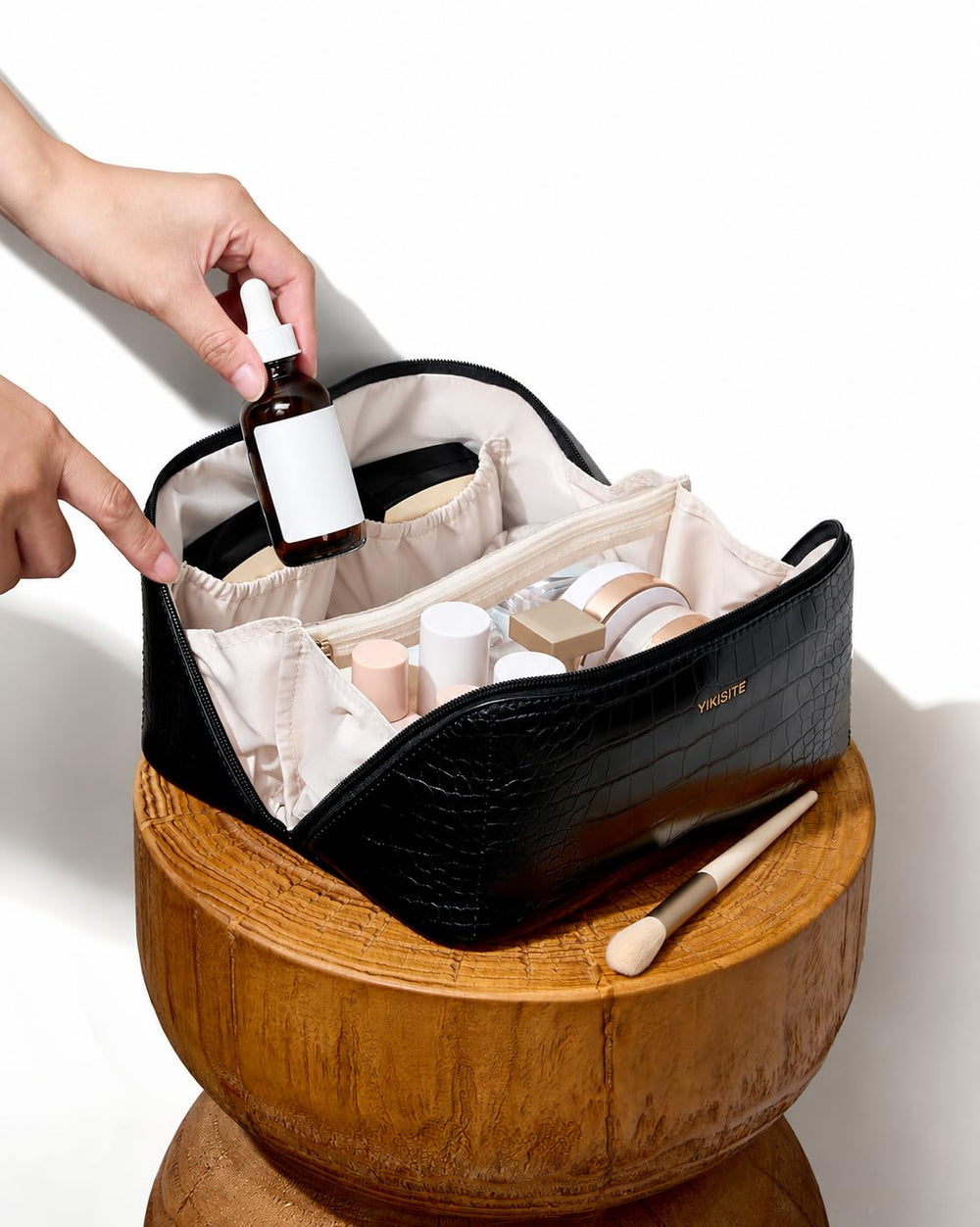 Yikisite on bathroom vanity demonstrating tidy storage and polished look